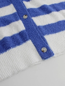 Women's V-neck blue and white striped knit cardigan with textured marble buttons