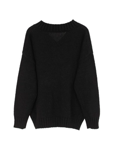 Detail of ribbed cuffs and hem on this loose-fit black oversized knitted sweater