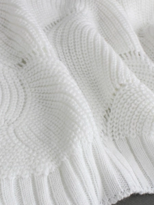 White high-neck long-sleeve knit dress featuring ribbed hem and wavy textured fabric