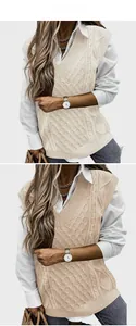 Detailed view of cream cable-knit V-neck vest sweater over white button-down shirt