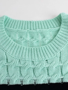 Mint green cable knit sweater with crew neck and textured vertical ribbed detailing