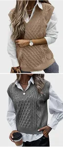 Detail view of V-neck cable knit sweater vest with diamond pattern in camel and gray
