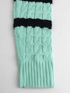 Women's crewneck knit sweater with mint green cable knit pattern and navy blue stripes