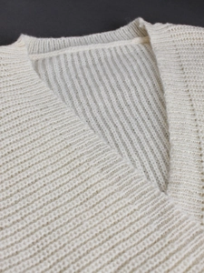 Women's V-neck rib-knit long-sleeve dress in off-white, soft textured knitwear for fall