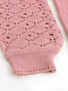 Pink hollow diamond knit cardigan featuring long sleeves and ribbed cuffs for women