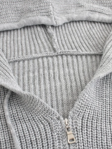 Women's light grey knit hoodie with metal zipper and chunky rib texture for autumn wear