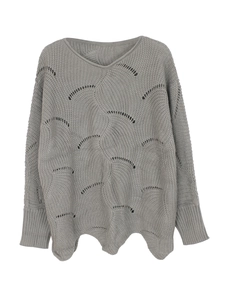Detail of grey knitted V-neck sweater with hollow fan texture and wavy hemline