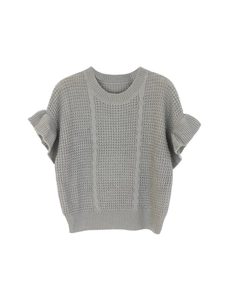 Detail of grey short sleeve knit top showing honeycomb texture and ruffle sleeve design