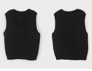 Front and back view of black V-neck cable knit vest showing diamond pattern details