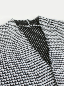 Women's long sleeve knitted cardigan featuring black and white textured honeycomb fabric