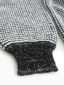 Women's long sleeve knit cardigan with black and white contrast texture and ribbed cuffs