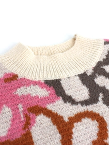 Women's knit vest sweater in cream with colorful large letter pattern jacquard design