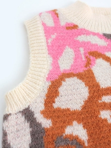 Short sleeveless knitted sweater vest with colorful jacquard patterns and ribbed round neck