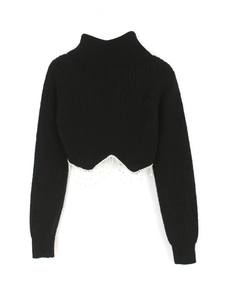 Women's black turtleneck cropped knit sweater with sparkling rhinestone fringe hem decoration