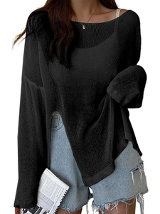 Detail of black long-sleeve knit top featuring a unique side slit design and casual fit