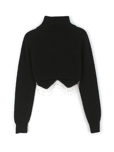 Women's black turtleneck cropped sweater with unique silver chain fringe hem details