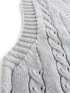 Light gray women's cable knit sleeveless vest with refined ribbed texture and warm feel