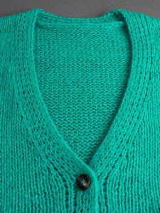 Women's V-neck chunky knit cardigan sweater in bright turquoise with button detail