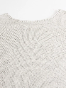 Women's cream white crew neck batwing sleeve sweater in soft knit fabric texture