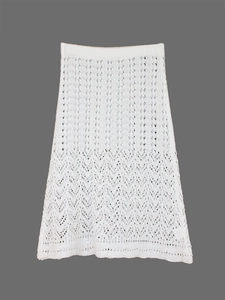 White crochet knit midi skirt with geometric hollow out patterns and wavy hemline