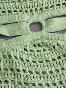 Mint green knit halter maxi dress with hollow out crochet details and textured fabric