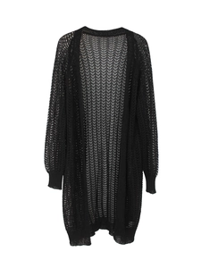 Detail of black hollow-out crochet knit cardigan with geometric mesh pattern texture