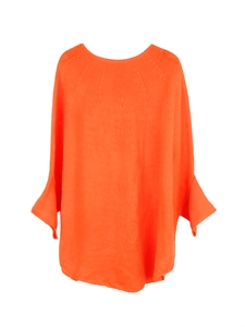 Detailed close-up of bright orange knit sweater with fine ribbed texture and round neck