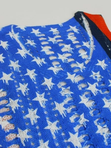 Knit V-neck sweater featuring American flag star pattern and hollow-out crochet texture