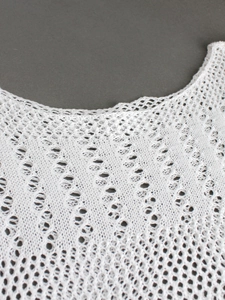 White off-shoulder mesh hollow knit midi dress with intricate openwork weave patterns