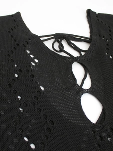 Women's black loose knit beach cover up with pointelle hollow pattern and lace-up detail