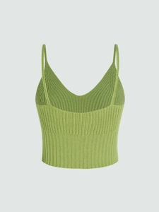 Green knitted camisole top featuring vertical ribbed texture and slim fit cropped design