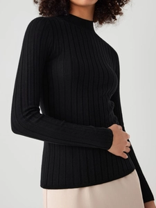 Slim fit black ribbed knit sweater with a high neckline and long sleeves for women