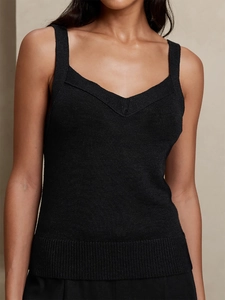 Women black knitted v-neck tank top in slim fit style with wide shoulder straps