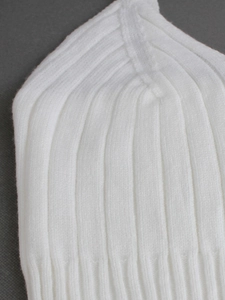 Close-up of a white V-neck ribbed knit two-piece camisole set with fine texture