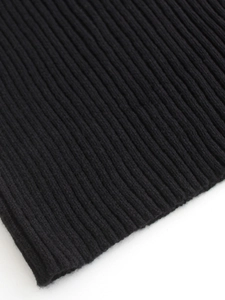 Close-up of high-quality black ribbed knit cuffs showing detailed fabric texture