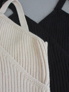 Women's V-neck ribbed knit tank tops in black and beige colors with cross strap design
