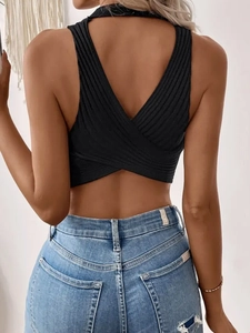 Women's black knit halter top with criss-cross back detail and ribbed texture design