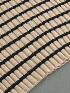 Two-piece ribbed knit sweater set with apricot and black horizontal stripes