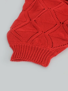 Red long sleeve knit sweater with hollow geometric pattern and ribbed cuffs for women