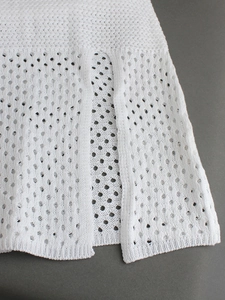 White crochet knit long dress with pointelle diamond patterns and vertical slit detail