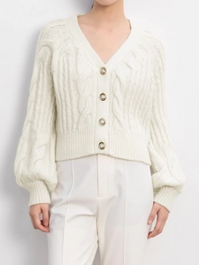 Women's cream white cable knit cardigan with V-neck, pearl buttons and lantern sleeves