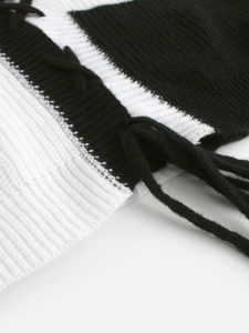 Cardigan en tricot col V pour femme avec blocs de couleurs noir et blanc et lacets sur manche