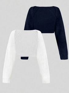 Detail of two-piece ribbed knit shrug set in black and white with ultra-short design