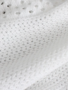 White knit long slit dress with hollow-out pattern and premium textured fabric details