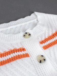 Women's white knitted cardigan with orange stripes and tortoise shell buttons