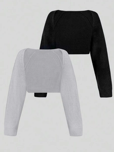 Detailed view of rib-knitted long sleeve bolero shrugs in black and light grey colors
