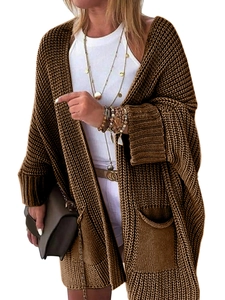 Detail view of a chunky knit dark brown cardigan sweater with large front pockets