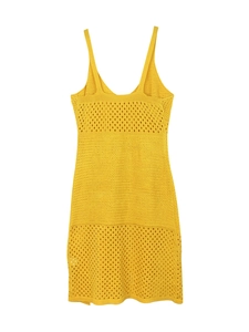 Detailed knit texture and openwork crochet patterns on a bright yellow summer dress