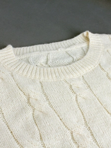 Classic white cable knit sweater dress with crew neck for autumn and winter seasons