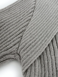 Grey long sleeve cropped pullover knit sweater in a thick ribbed knit texture